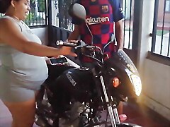 Wife organizes a quick sale of husband's motorcycle, leading to sexual encounter.